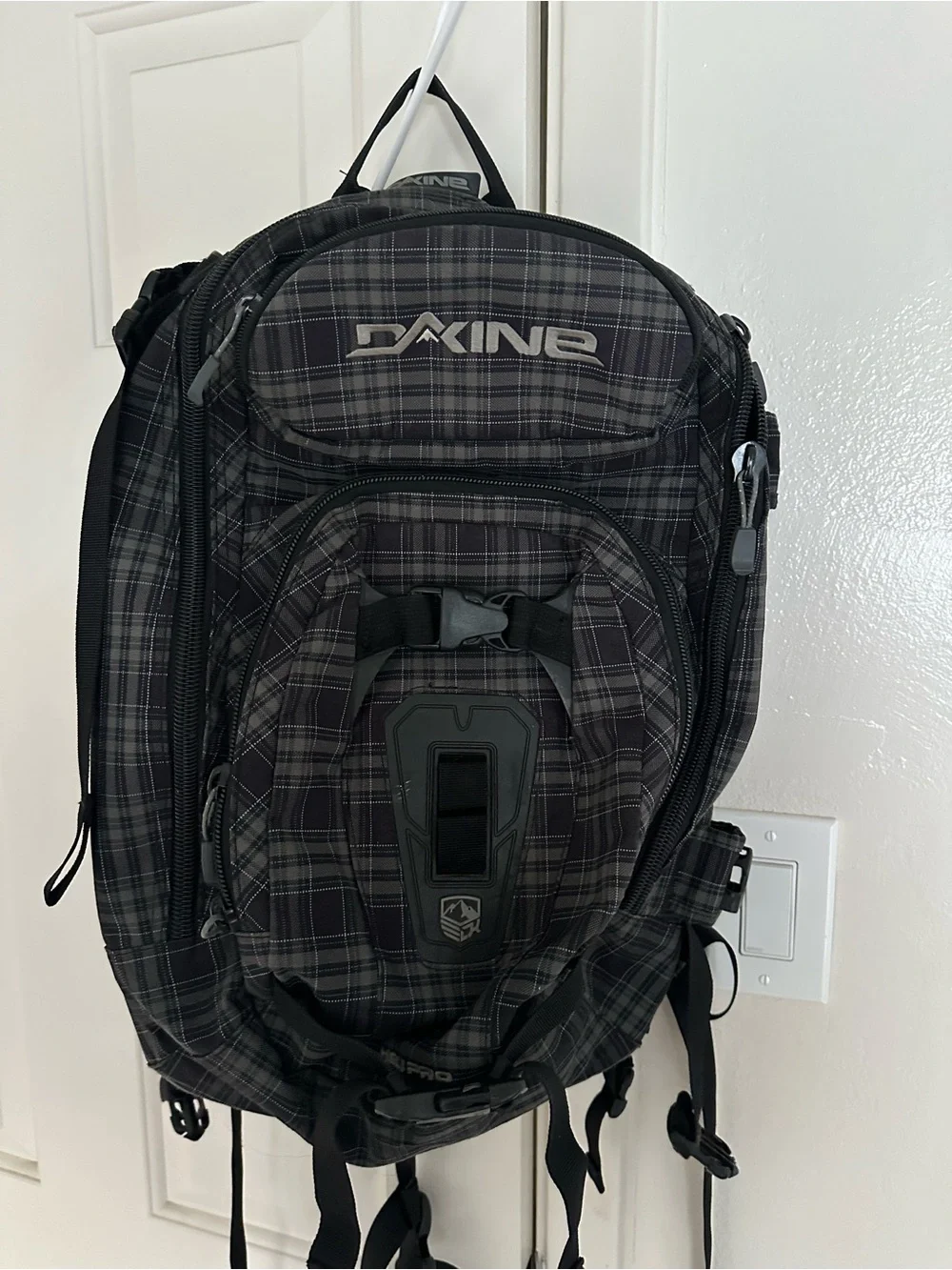 Dakine Black Plaid Men’s Backpack with Gray Accents